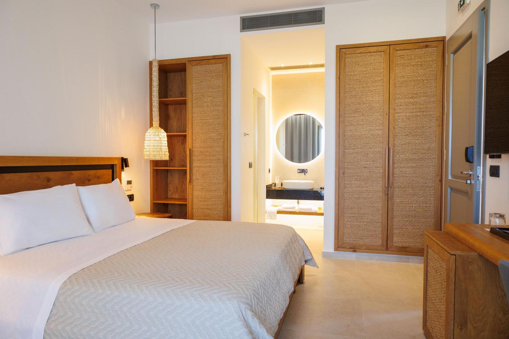 Kouros Blanc Resort & Suites Pounda Bilik gambar