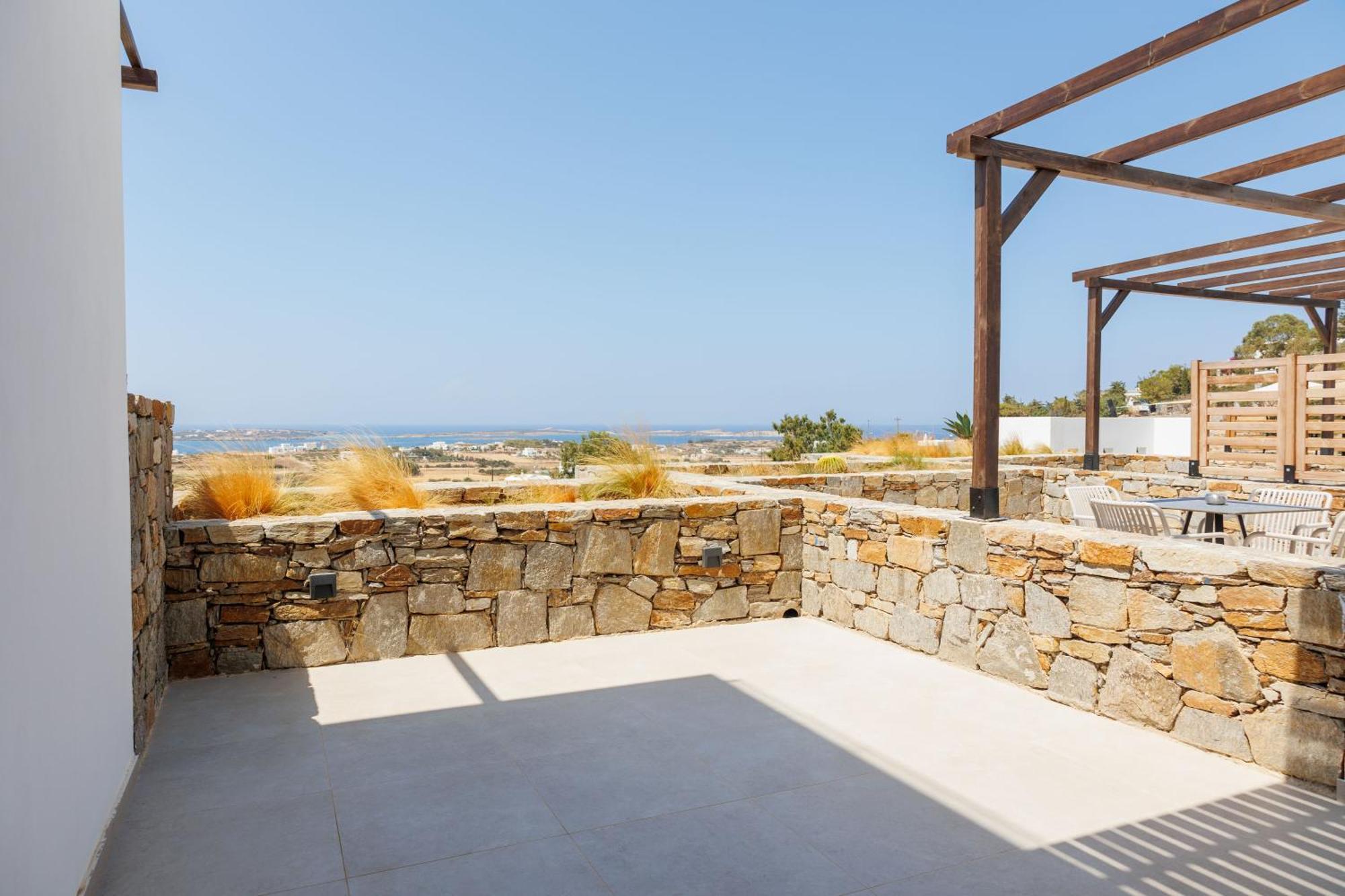 Kouros Blanc Resort & Suites Pounda Bilik gambar
