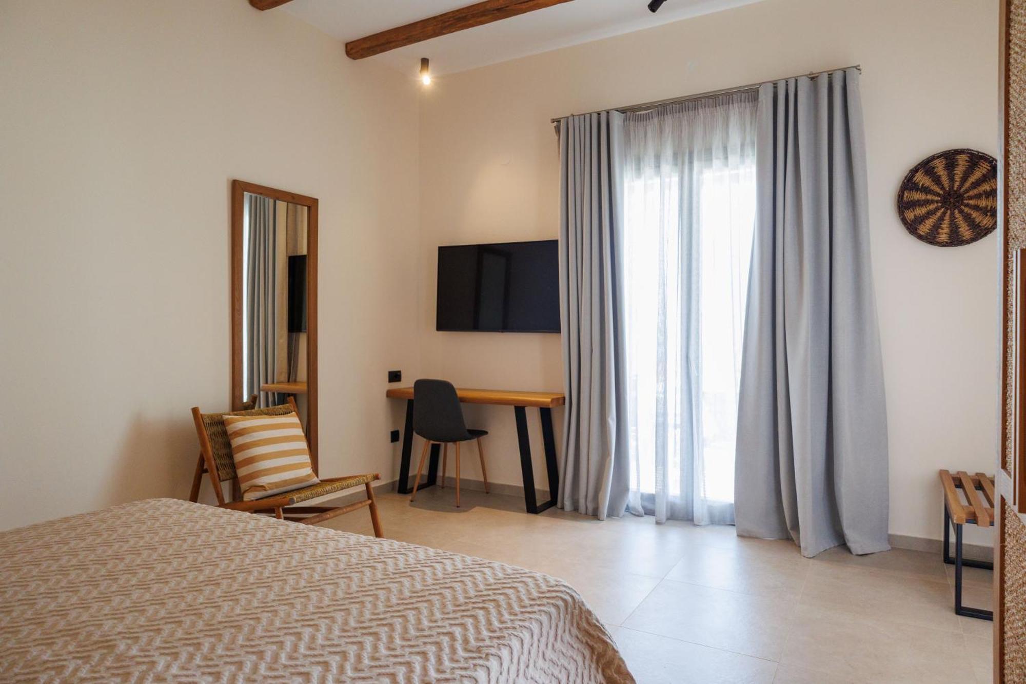 Kouros Blanc Resort & Suites Pounda Bilik gambar